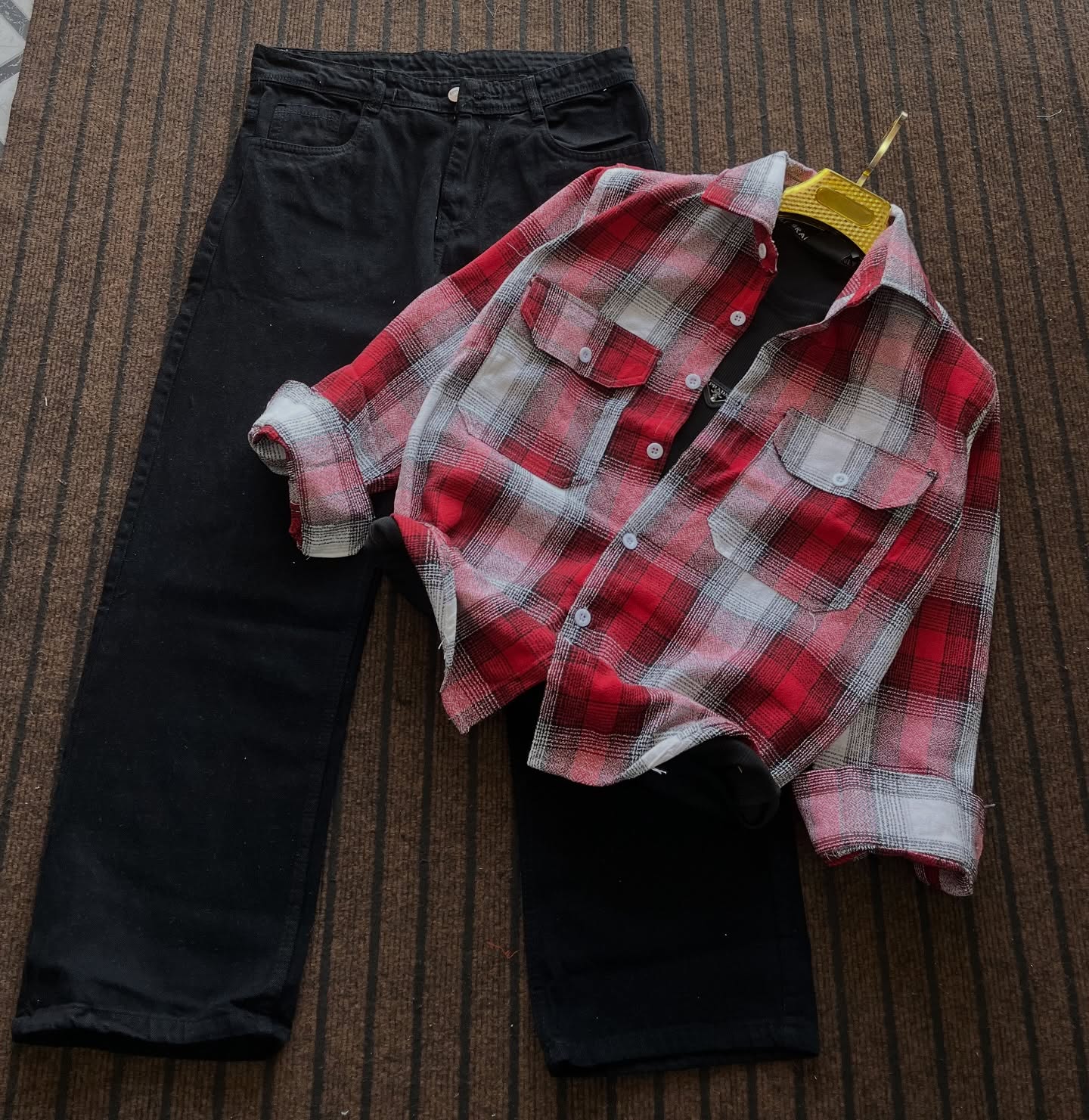 Checkered Flannel Shirt with Solid Black Jeans – Casual Comfort Meets Classic Style