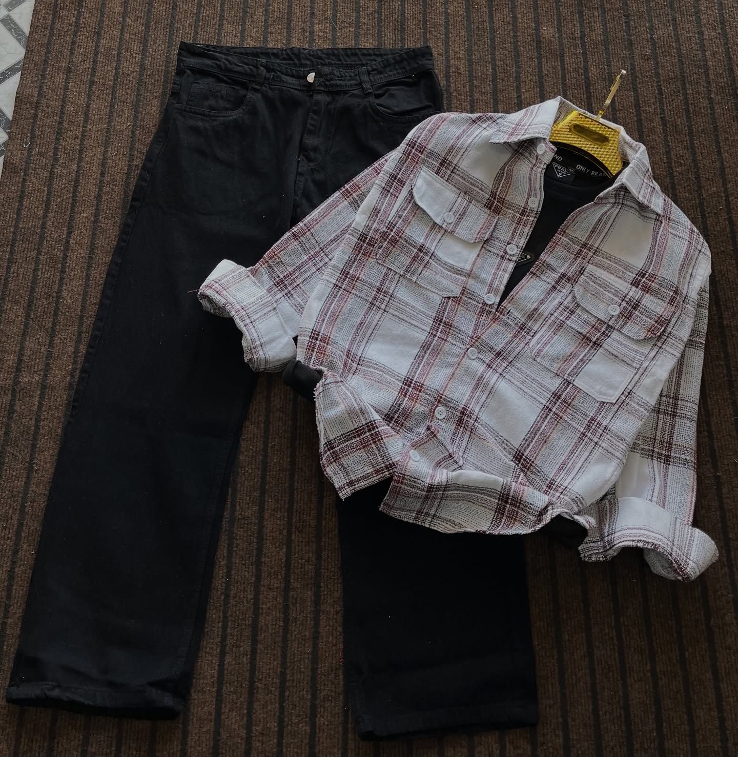 Checkered Flannel Shirt with Solid Black Jeans – Casual Comfort Meets Classic Style