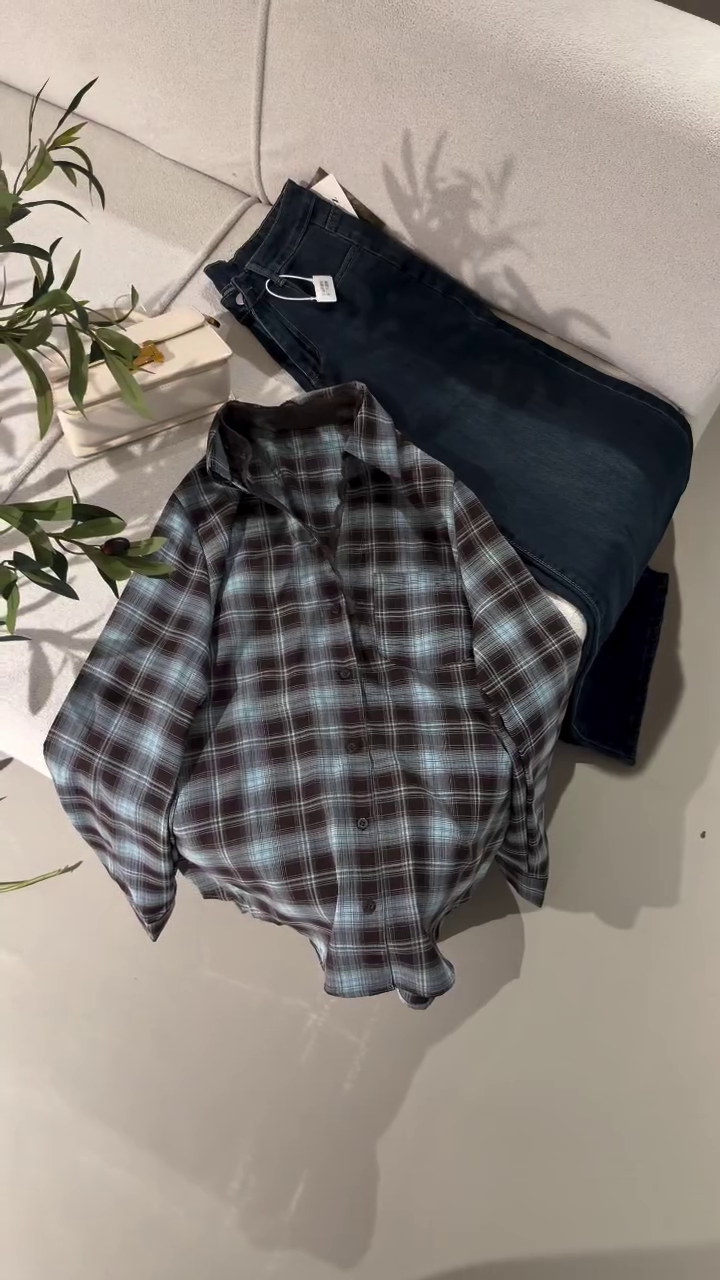 Effortless Cool: Blue and Black Plaid Shirt with Classic Denim Jeans