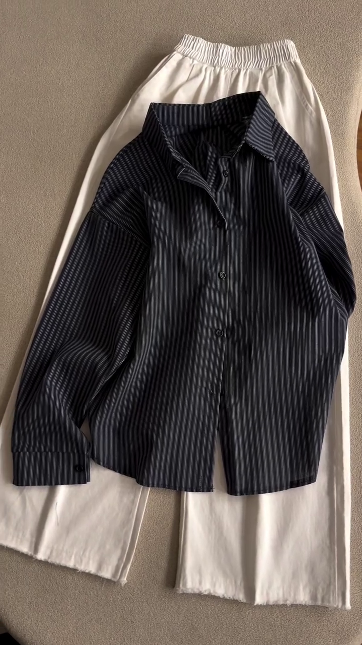 Effortless Chic: Striped Oversized Shirt with White Wide-Leg Trousers