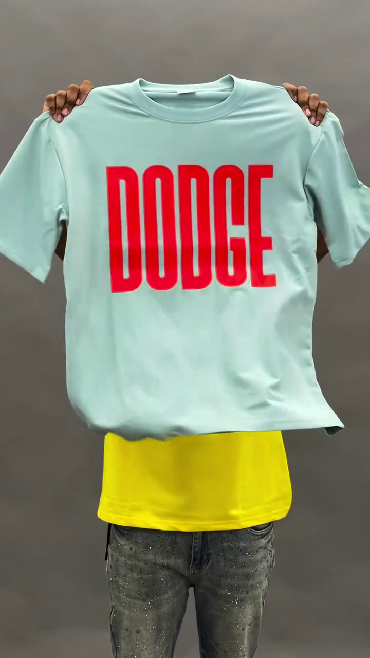 Bold & Casual: White Oversized Crew Neck T-Shirt with “DODGE” Print