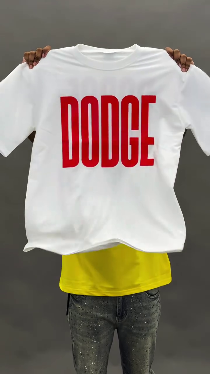 Bold & Casual: White Oversized Crew Neck T-Shirt with “DODGE” Print