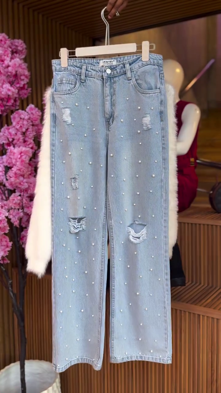 Cozy & Chic: White Fluffy Cropped Sweater with Blue Wide-Leg Jeans