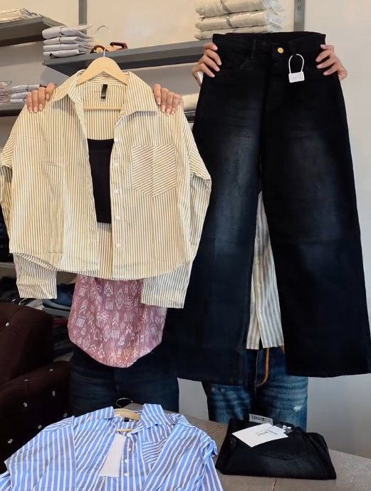 Chic & Contemporary: White Button-Down Shirt with Black Top and Wide-Leg Black Jeans