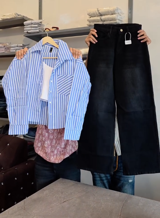 Chic & Contemporary: White Button-Down Shirt with Black Top and Wide-Leg Black Jeans