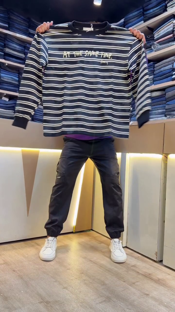Modern White Half-Zip Sweatshirt with Striped Sleeves & Graphic Chest Print