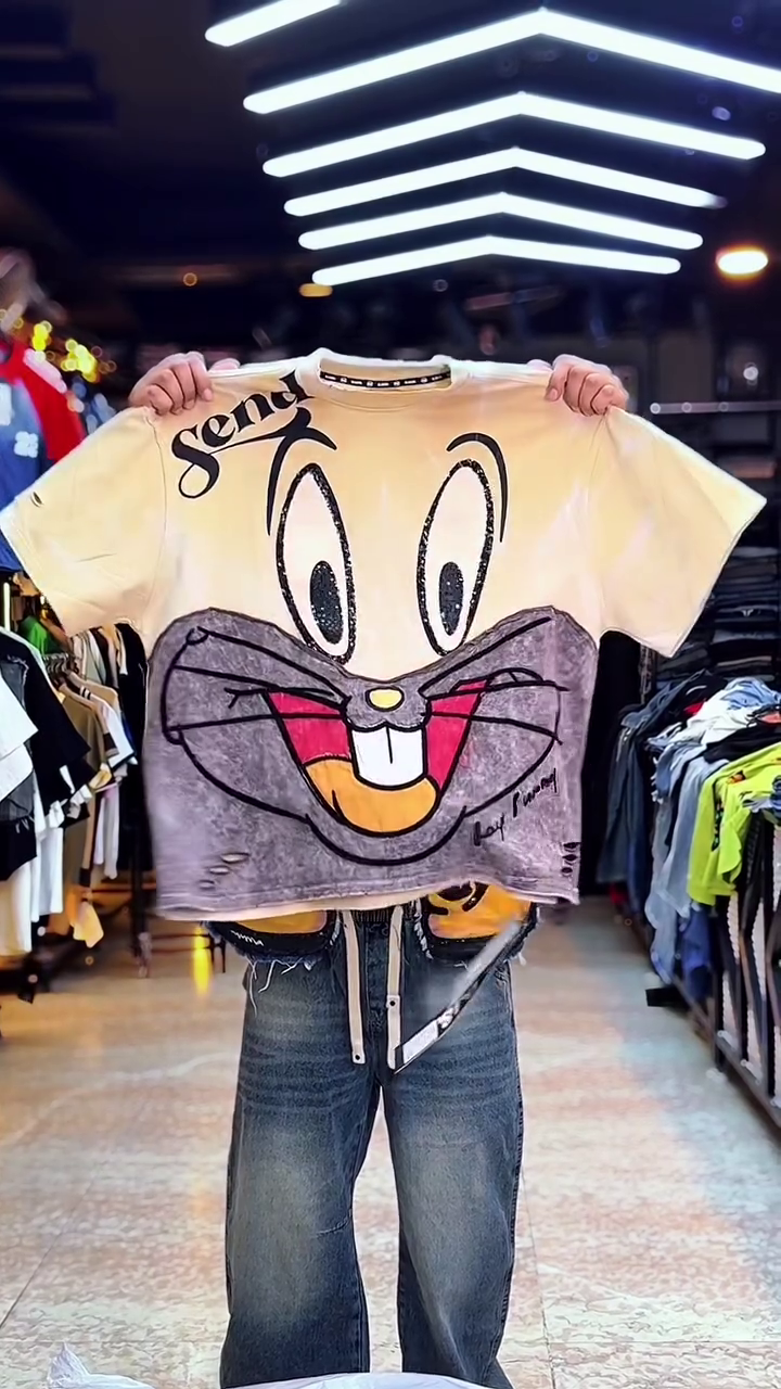 Playful Edge: Doraemon Graphic T-Shirt with “Artist” Print and Distressed Sleeves