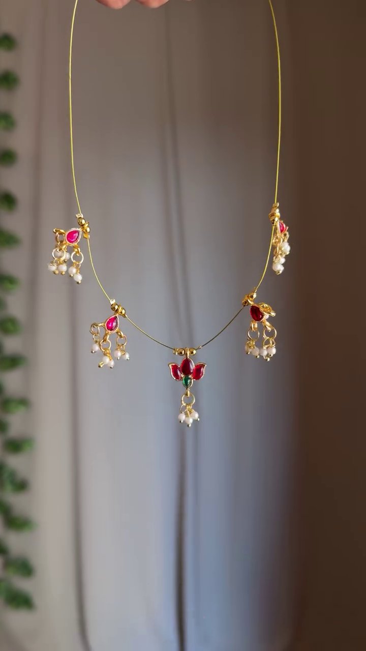 Delicate Elegance: Minimalist Necklace with Pearl Thread and Floral Gem Locket