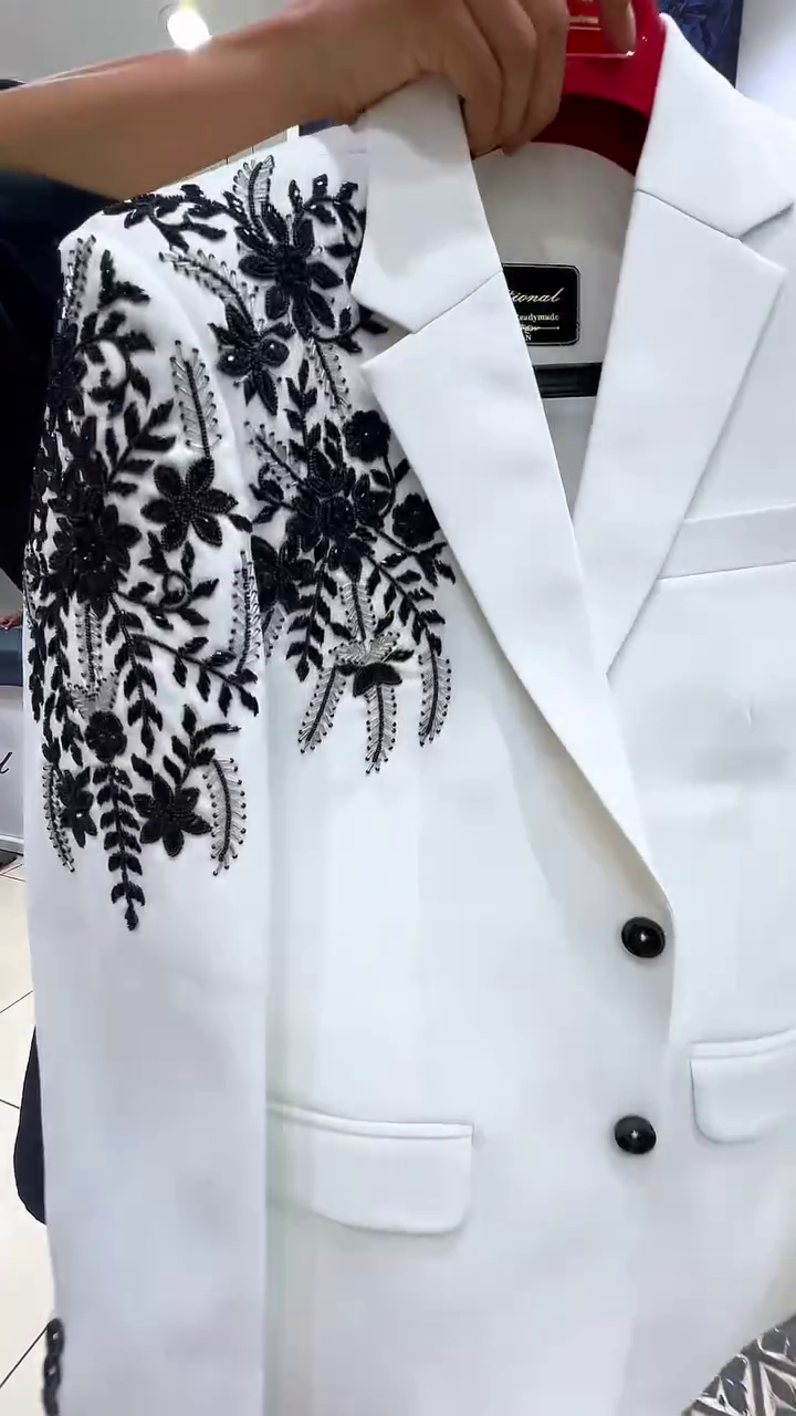 Sophisticated & Stylish: White Men’s Suit with Black Floral Embroidery
