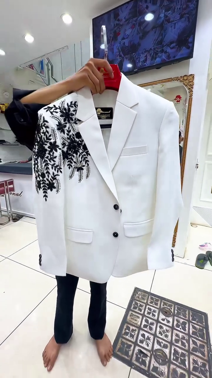 Sophisticated & Stylish: White Men’s Suit with Black Floral Embroidery