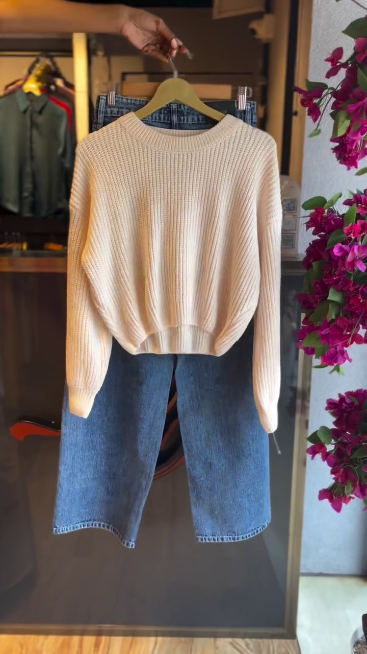 Cozy & Chic: Women’s Beige Chunky Knit Crewneck Sweater with Denim Jeans