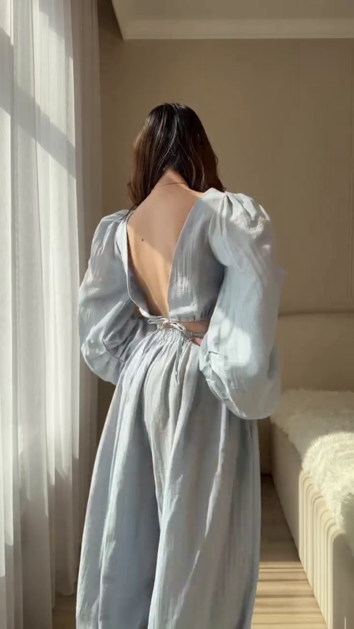 Chic & Breezy: Light Blue Two-Piece Set with Puff-Sleeve Cropped Top and Wide-Leg Trousers