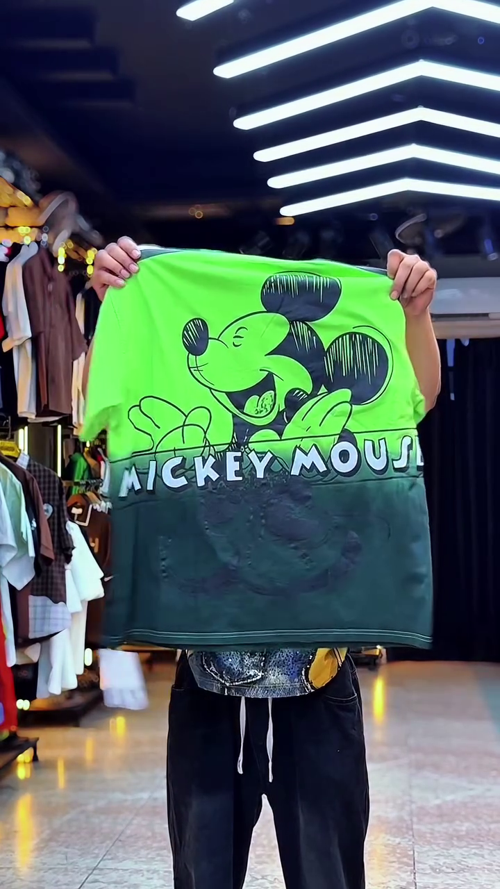 Playful Luxury: Designer Graphic T-Shirt Featuring Winnie the Pooh