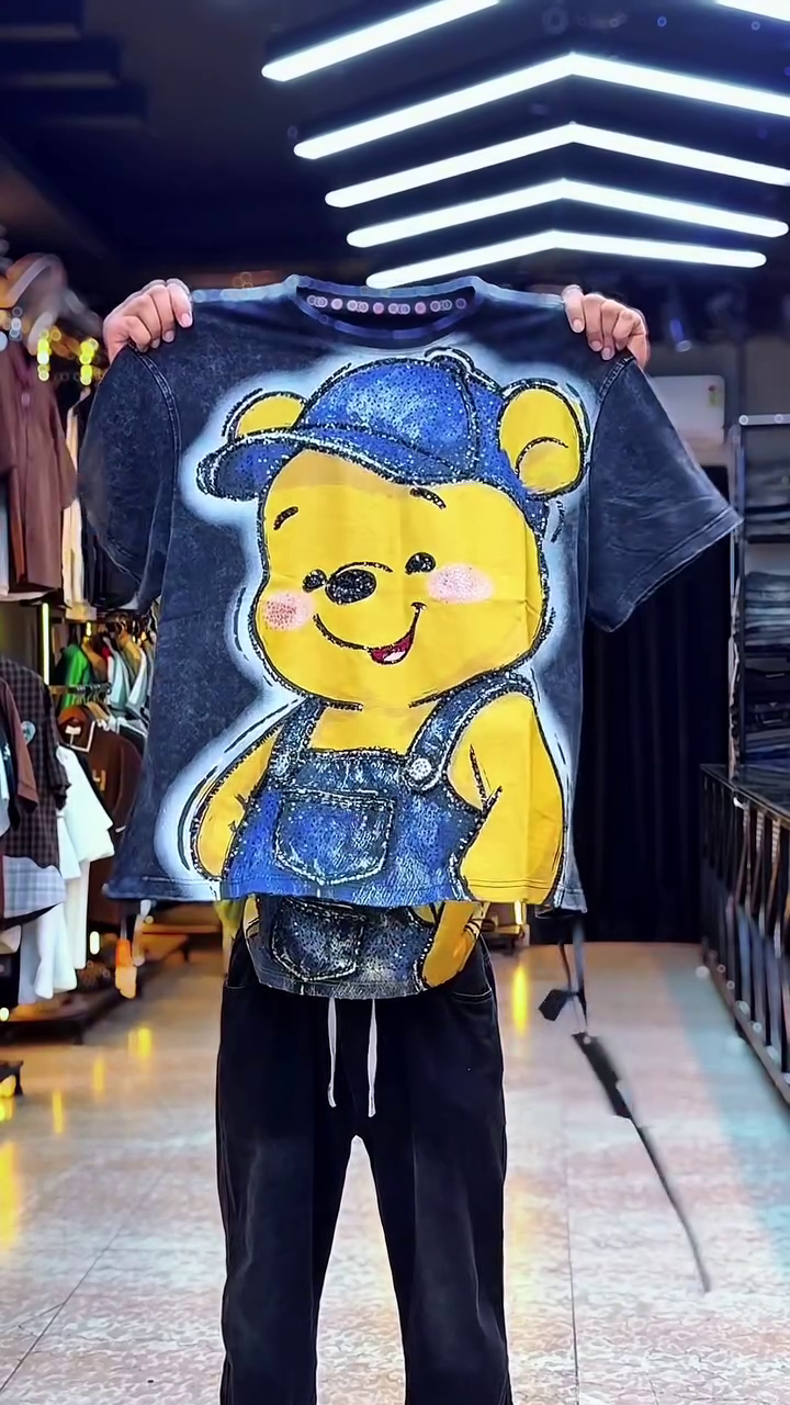 Playful Luxury: Designer Graphic T-Shirt Featuring Winnie the Pooh