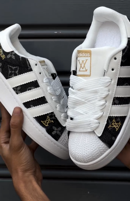 Custom-Style Street Icon: Adidas Superstar Sneakers in Light Blue & White with Decorative Branding