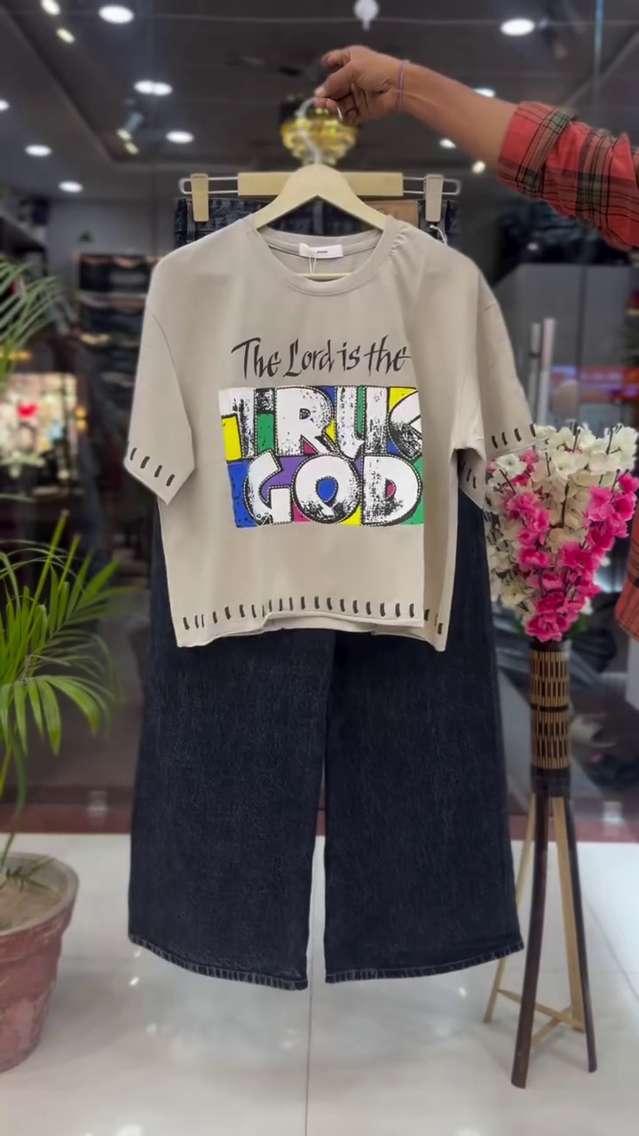 Faith & Street Style: Pink Graphic T-Shirt with Dark Denim Jeans