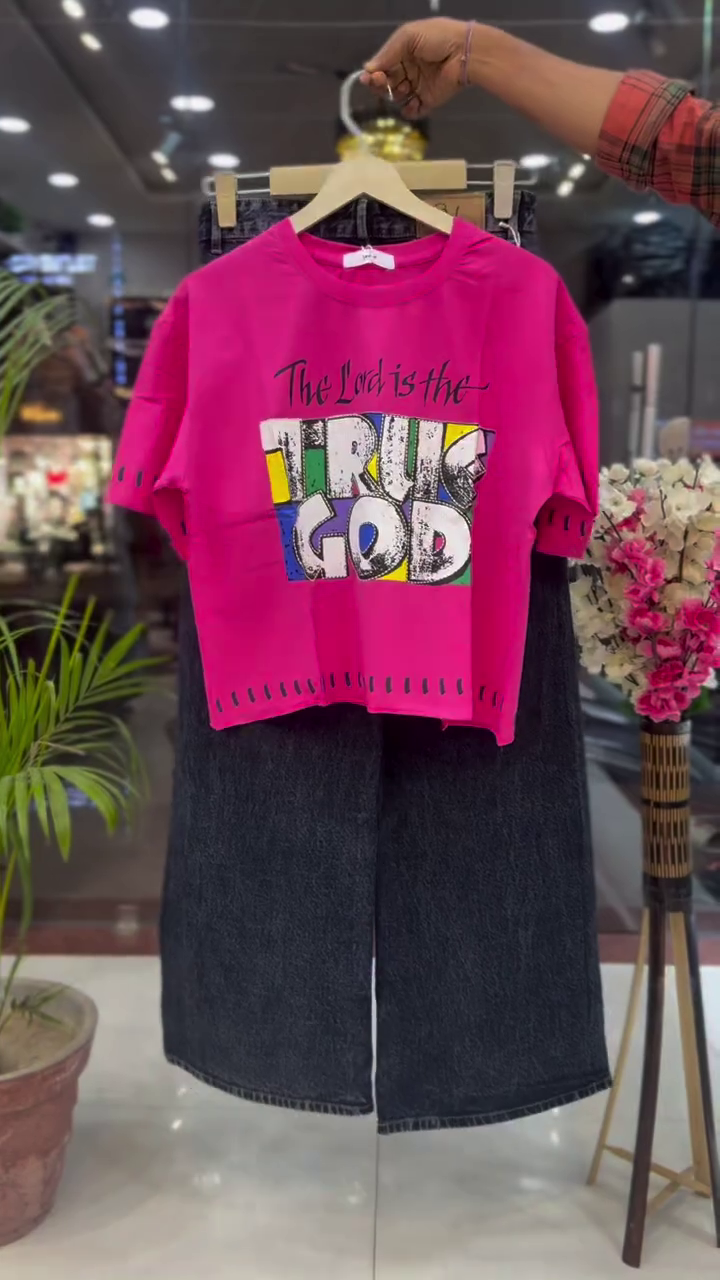 Faith & Street Style: Pink Graphic T-Shirt with Dark Denim Jeans
