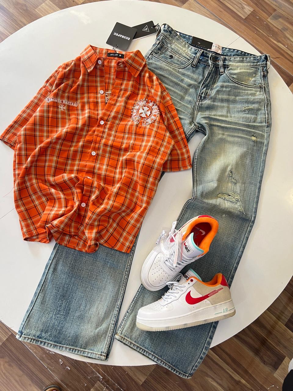 Bold Street Style: Orange Plaid Shirt with Distressed Denim & White Sneakers