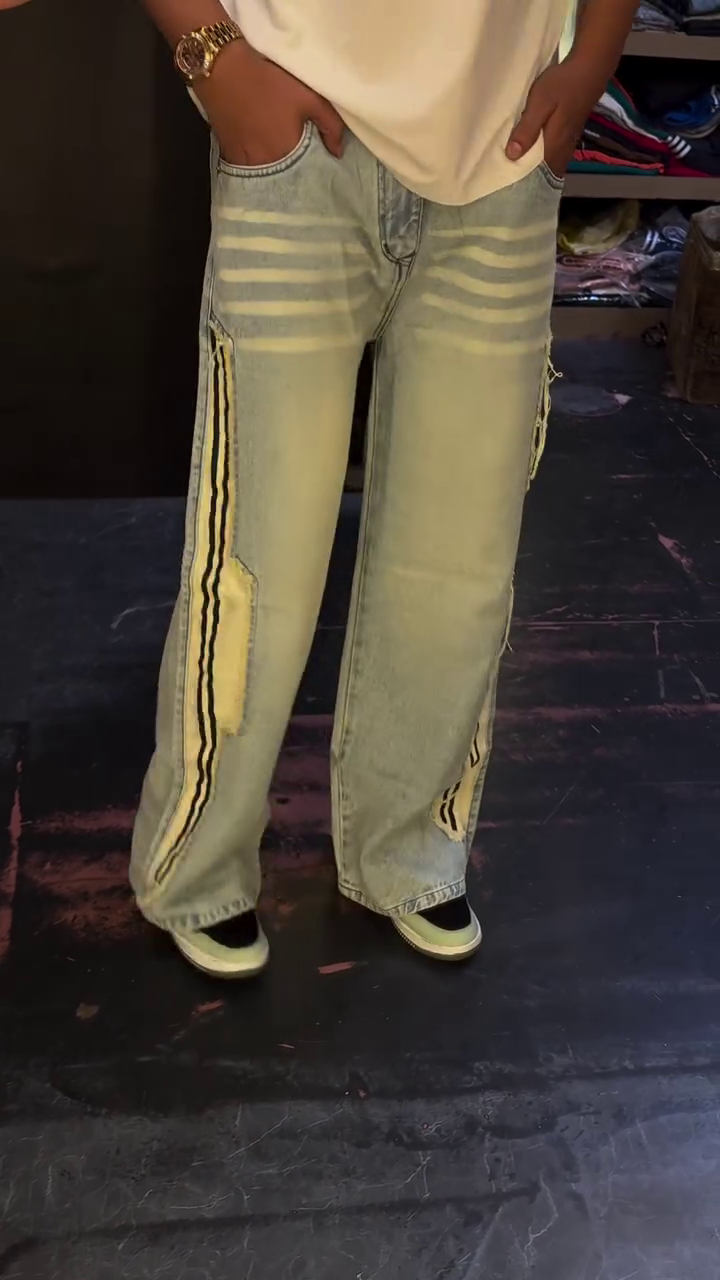 Stylish Light Wash Wide-Leg Cargo Jeans with Striped Side Detail and Utility Pocket Design