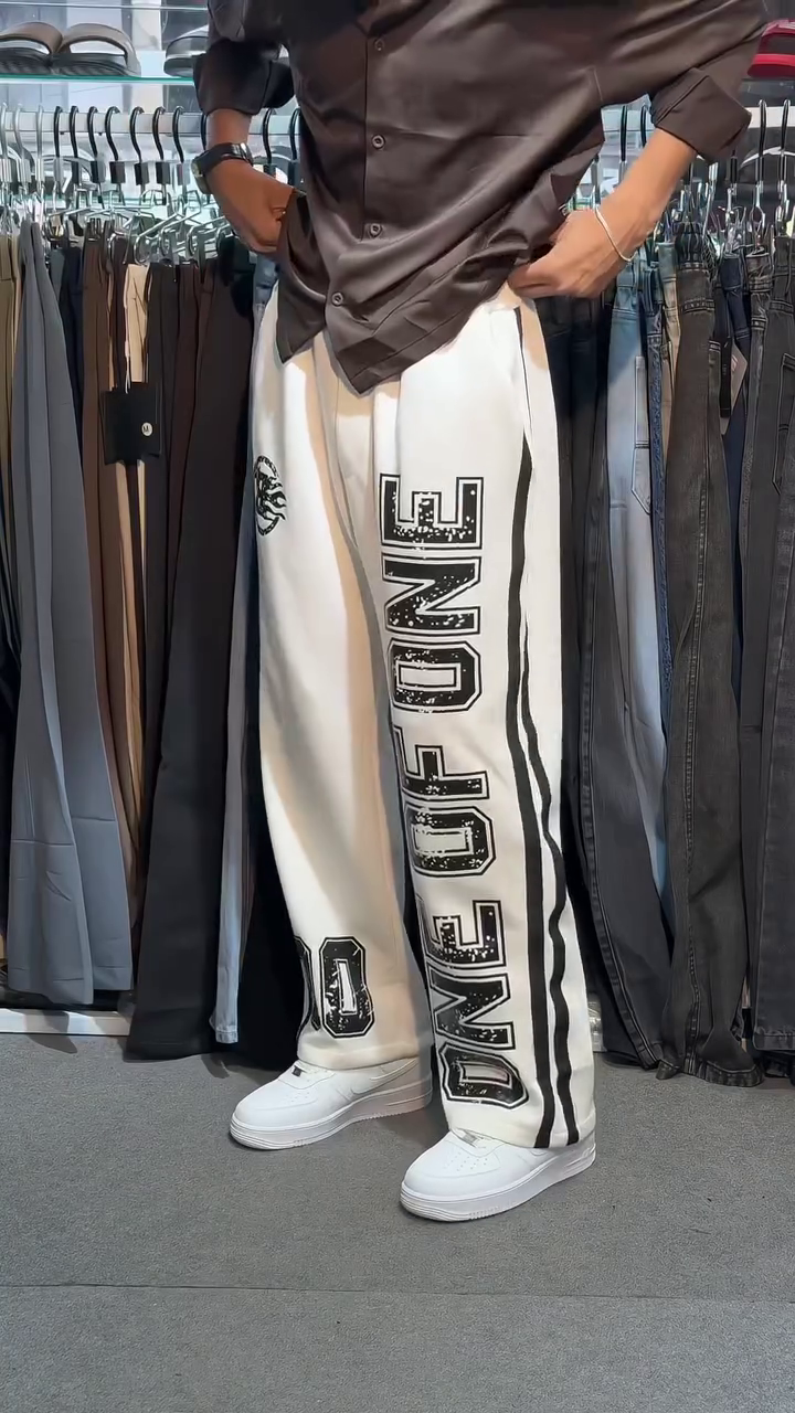 Trendy Wide-Leg Graphic Track Pants with Bold Side Lettering, Contrast Stripes and Relaxed Streetwear Fit