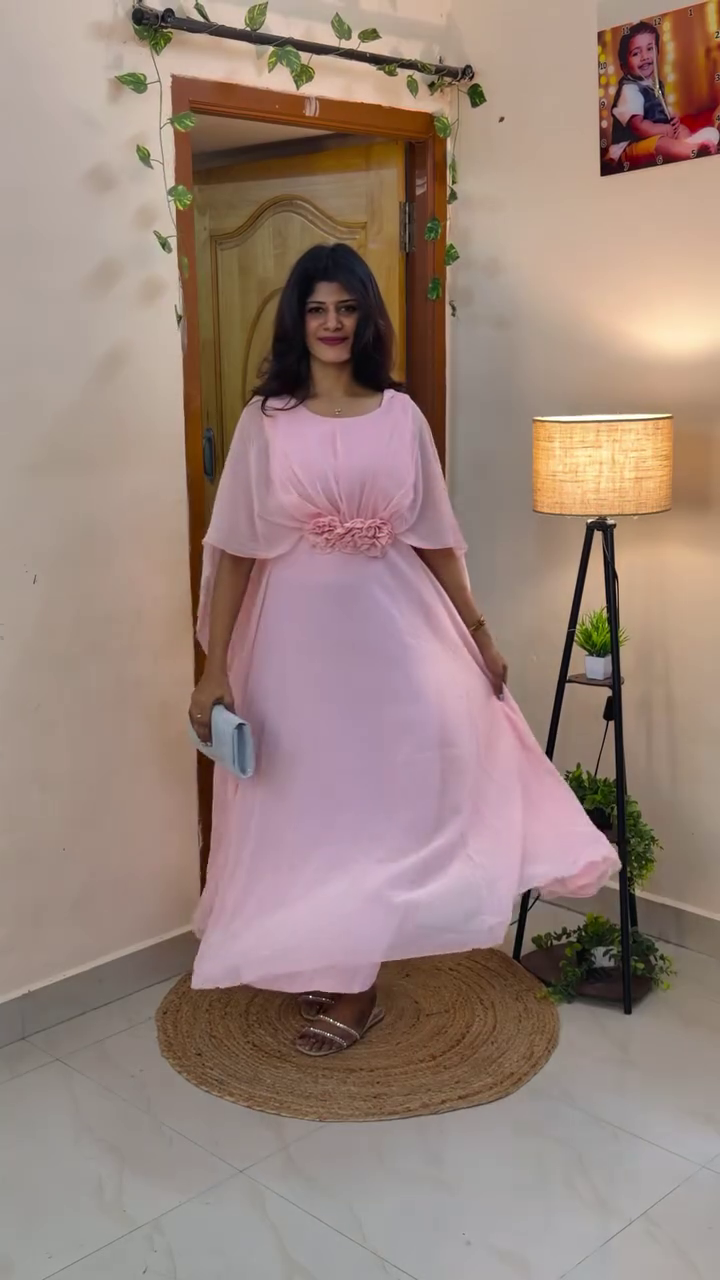 Elegant Maxi Dress with Flowing Cape Sleeves and Floral Waist Detailing for a Graceful Look