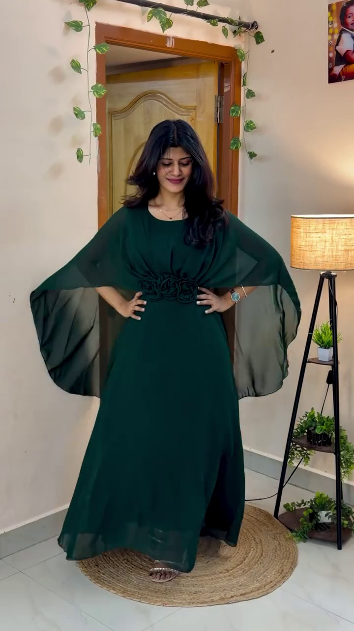 Elegant Maxi Dress with Flowing Cape Sleeves and Floral Waist Detailing for a Graceful Look